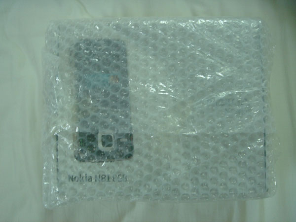 DHL Parcel Opened (Bubble Wrap Protecting The Phone)